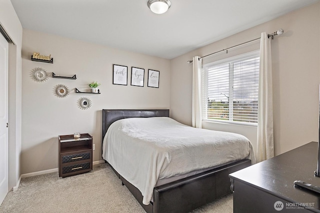 15013 Iverson Loop SE, Yelm, WA 98597 - bedroom featuring light colored carpet and baseboards