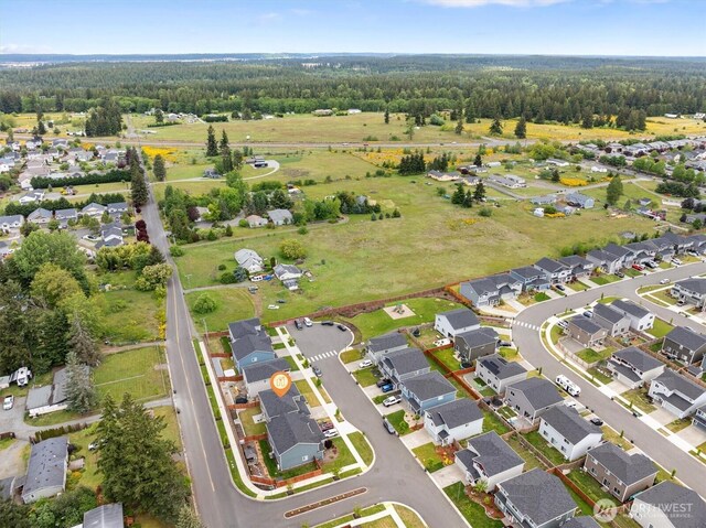 15013 Iverson Loop SE, Yelm, WA 98597 - aerial overview of property's location featuring a forest and nearby suburban area