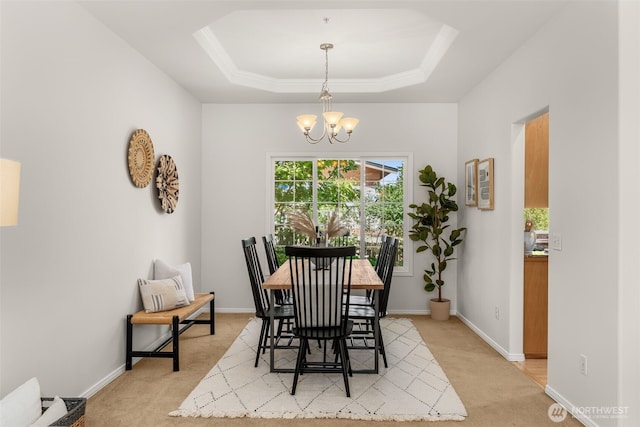 2024 N 145th St, Shoreline, WA 98133 - dining space with light carpet, a chandelier, a tray ceiling, and baseboards