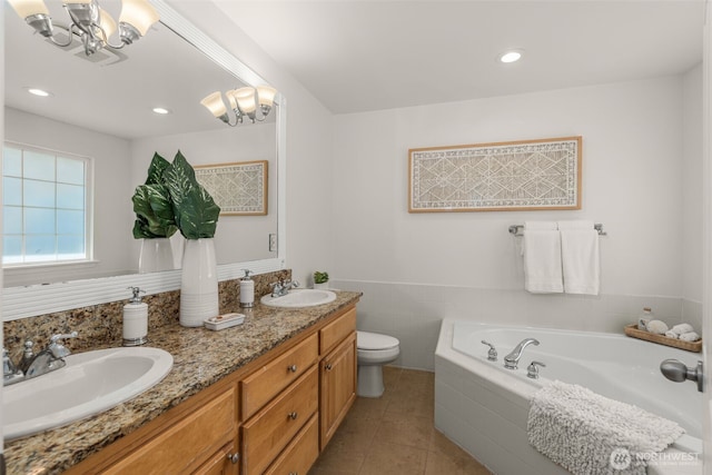 2024 N 145th St, Shoreline, WA 98133 - full bathroom featuring double vanity, toilet, a bath, tile patterned flooring, and a chandelier