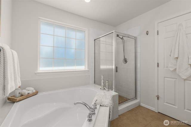 2024 N 145th St, Shoreline, WA 98133 - bathroom featuring a bath, a shower stall, and tile patterned floors