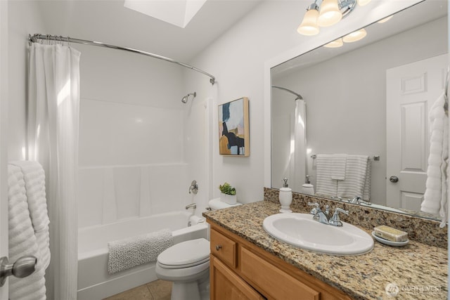 2024 N 145th St, Shoreline, WA 98133 - full bathroom featuring vanity, shower / bathtub combination with curtain, toilet, a skylight, and tile patterned floors