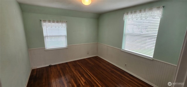 405 E Park St, Dayton, WA 99328 - unfurnished room featuring wood finished floors, wainscoting, and baseboards