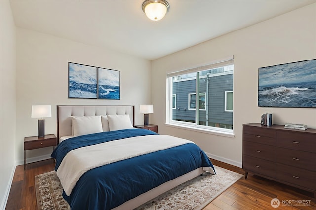 2440 Western Ave Unit 807, Seattle, WA 98121 - bedroom with wood finished floors