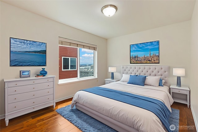 2440 Western Ave Unit 807, Seattle, WA 98121 - bedroom with wood finished floors