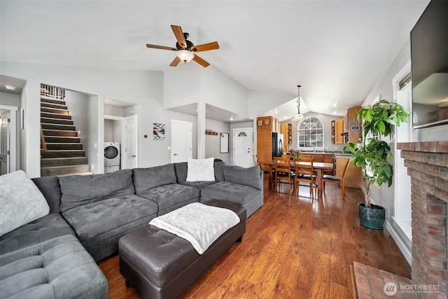 114 Creekside Pl, Cashmere, WA 98815 - living area with vaulted ceiling, washer / clothes dryer, ceiling fan, stairway, and dark wood-type flooring