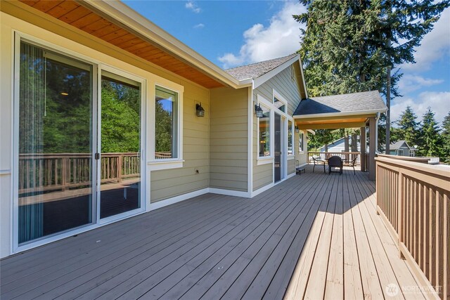 9440 Piperhill Dr SE, Olympia, WA 98513 - wooden terrace with outdoor dining area
