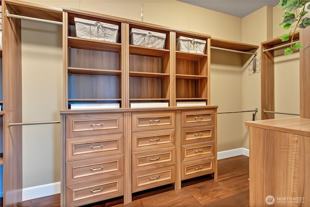 9440 Piperhill Dr SE, Olympia, WA 98513 - walk in closet with dark wood-type flooring
