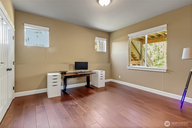 9440 Piperhill Dr SE, Olympia, WA 98513 - office area with plenty of natural light, wood finished floors, and baseboards