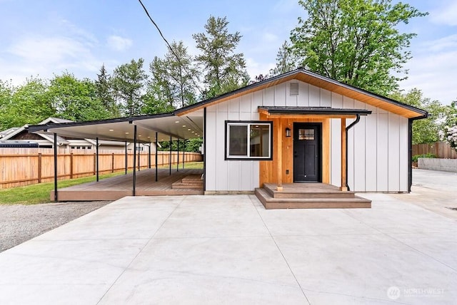 24212 SE 223rd St, Maple Valley, WA 98038 - view of front facade with a wooden deck and board and batten siding