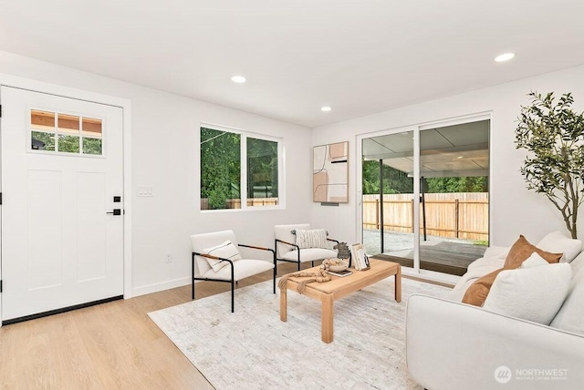 24212 SE 223rd St, Maple Valley, WA 98038 - living room featuring light wood-style flooring, recessed lighting, and baseboards