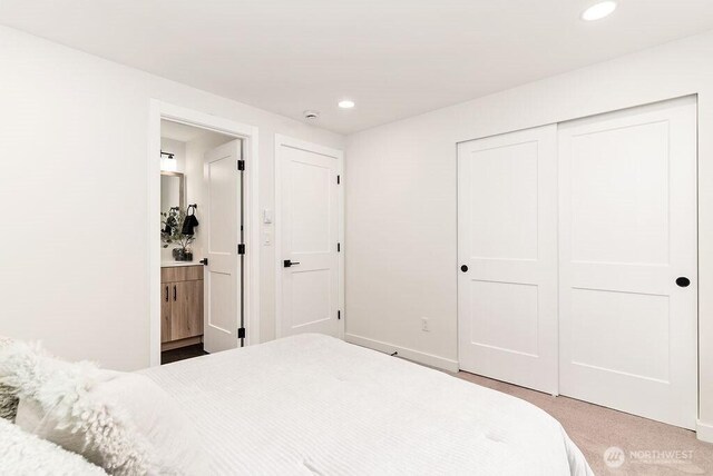 24212 SE 223rd St, Maple Valley, WA 98038 - bedroom with recessed lighting, a closet, ensuite bathroom, carpet flooring, and baseboards