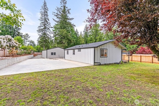 24212 SE 223rd St, Maple Valley, WA 98038 - back of house featuring board and batten siding and a patio
