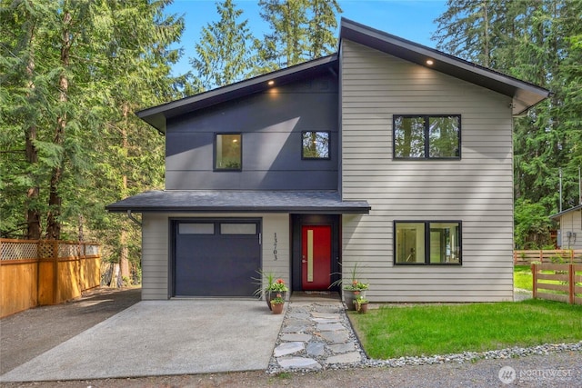 13703 Tastad Rd, Arlington, WA 98223 - modern home featuring driveway, a garage, and a shingled roof