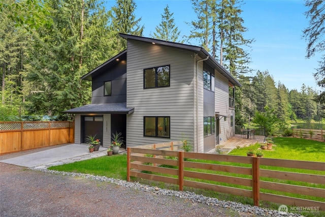 13703 Tastad Rd, Arlington, WA 98223 - contemporary home featuring driveway and a garage