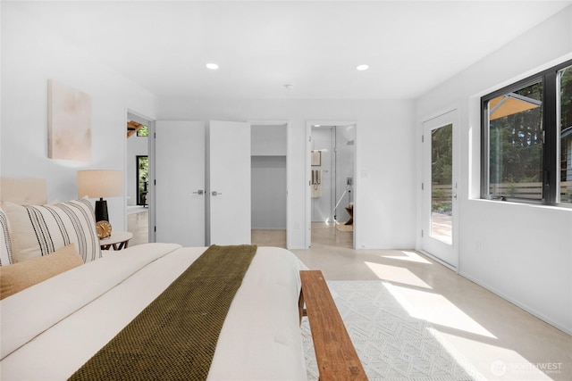 13703 Tastad Rd, Arlington, WA 98223 - bedroom with access to outside, multiple windows, recessed lighting, a walk in closet, and baseboards