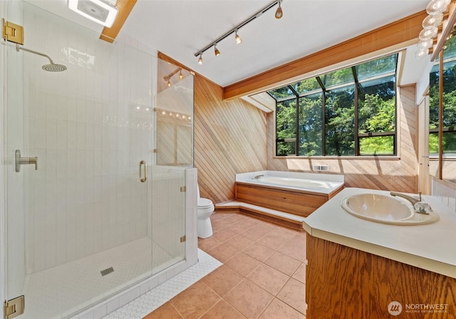 6217 Hillcrest Dr SW, Lakewood, WA 98499 - bathroom with a shower stall, tile patterned flooring, a garden tub, toilet, and vanity