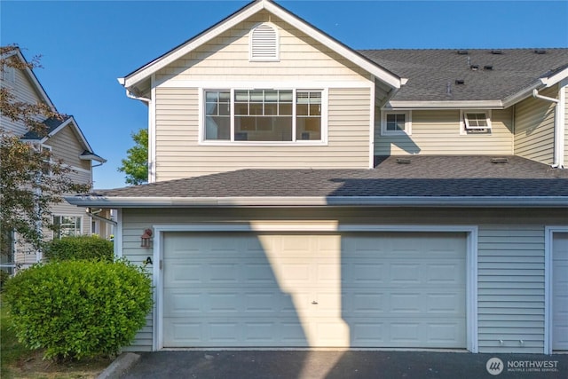 1133 63rd St SE Unit A, Auburn, WA 98092 - garage with asphalt driveway