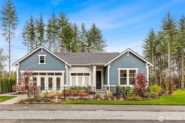 10610 134th Dr NE Unit 111, Lake Stevens, WA 98258 - craftsman-style home featuring french doors and a shingled roof