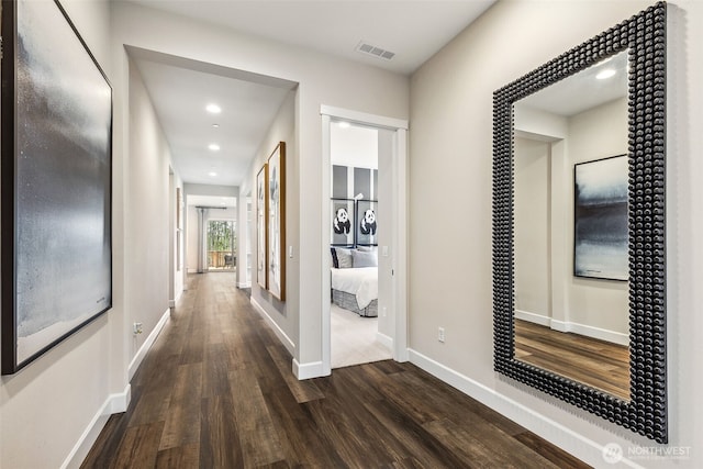 10610 134th Dr NE Unit 111, Lake Stevens, WA 98258 - hallway featuring dark wood finished floors, baseboards, and recessed lighting