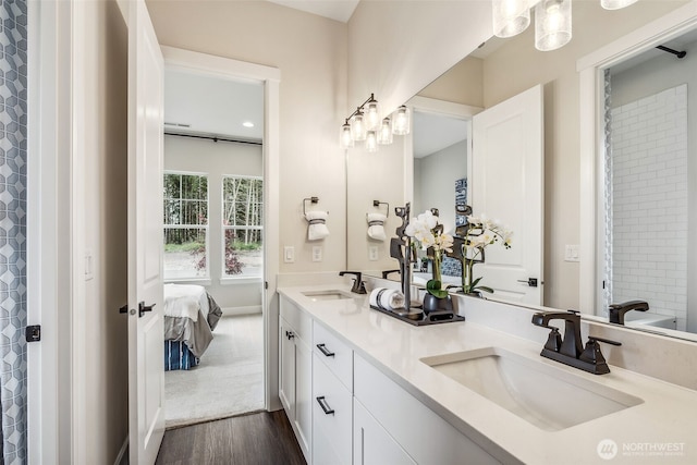 10610 134th Dr NE Unit 111, Lake Stevens, WA 98258 - ensuite bathroom with double vanity and wood finished floors