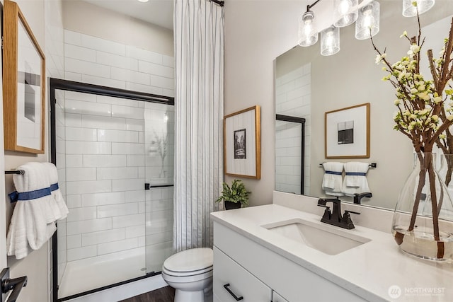 10610 134th Dr NE Unit 111, Lake Stevens, WA 98258 - full bath with vanity, a stall shower, and toilet