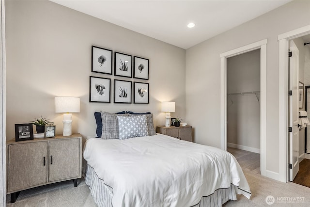 10610 134th Dr NE Unit 111, Lake Stevens, WA 98258 - bedroom with a spacious closet, a closet, carpet flooring, baseboards, and recessed lighting