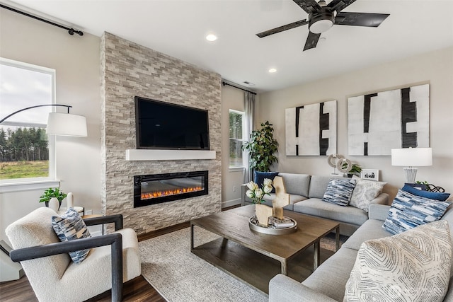 10610 134th Dr NE Unit 111, Lake Stevens, WA 98258 - living area featuring wood finished floors, ceiling fan, plenty of natural light, a stone fireplace, and recessed lighting