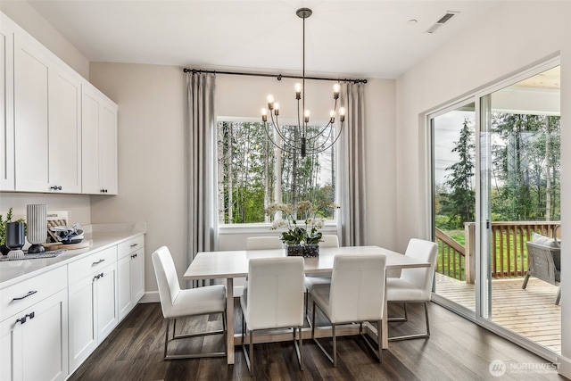 10610 134th Dr NE Unit 111, Lake Stevens, WA 98258 - dining space with a chandelier, healthy amount of natural light, and dark wood-style floors