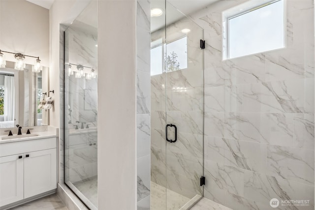 10610 134th Dr NE Unit 111, Lake Stevens, WA 98258 - bathroom with marble finish flooring, vanity, a marble finish shower, and plenty of natural light