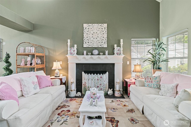 7608 145th Avenue Ct E, Sumner, WA 98390 - living area with a fireplace and a high ceiling