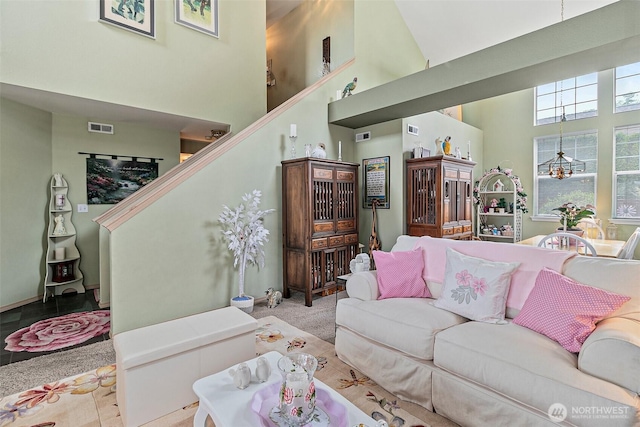7608 145th Avenue Ct E, Sumner, WA 98390 - living room with a high ceiling and stairs
