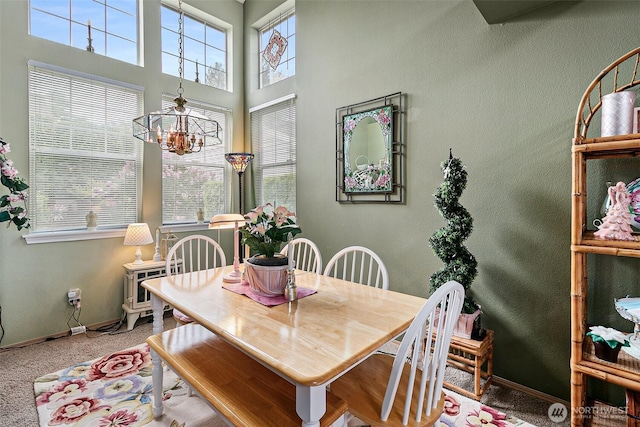7608 145th Avenue Ct E, Sumner, WA 98390 - dining space with a chandelier and baseboards