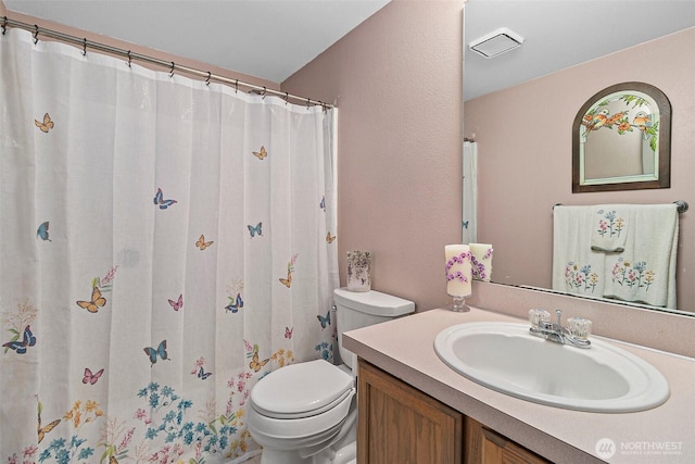 7608 145th Avenue Ct E, Sumner, WA 98390 - full bathroom featuring vanity, toilet, and a shower with shower curtain