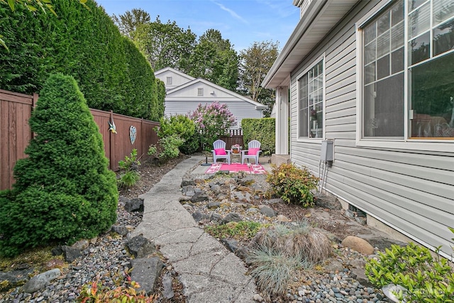 7608 145th Avenue Ct E, Sumner, WA 98390 - fenced backyard featuring a patio area