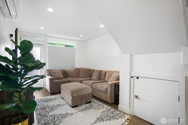 1055 S Cloverdale, Seattle, WA 98108 - living area featuring wood finished floors, recessed lighting, and a wall unit AC