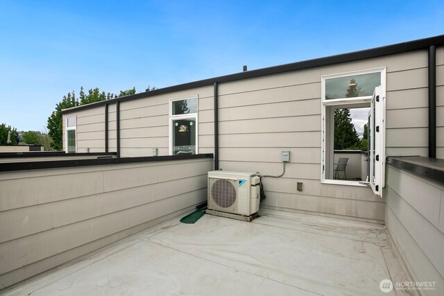 1055 S Cloverdale, Seattle, WA 98108 - view of patio / terrace featuring ac unit