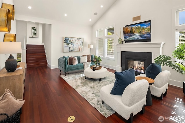 10022 NE 110th St, Kirkland, WA 98033 - living area featuring baseboards, a multi sided fireplace, recessed lighting, stairs, and wood finished floors
