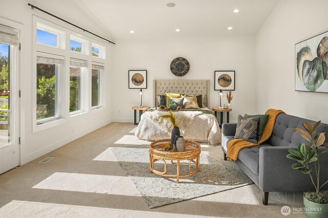 10022 NE 110th St, Kirkland, WA 98033 - bedroom with multiple windows, carpet, recessed lighting, baseboards, and vaulted ceiling