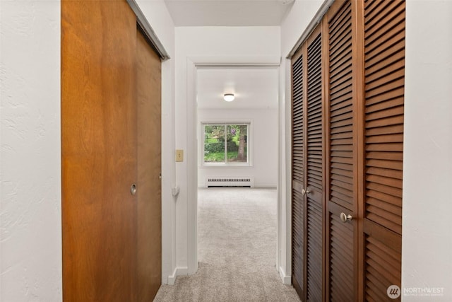 525527 16th Ave SE, Olympia, WA 98501 - corridor with carpet floors and a baseboard radiator