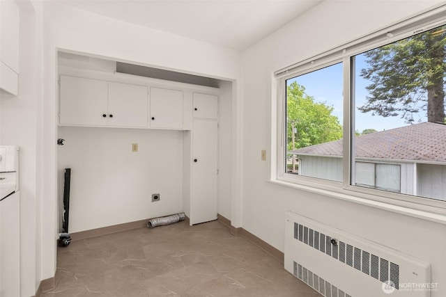 525527 16th Ave SE, Olympia, WA 98501 - laundry room with radiator, hookup for an electric dryer, and baseboards