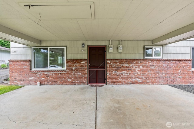 525527 16th Ave SE, Olympia, WA 98501 - view of exterior entry featuring brick siding and a patio area