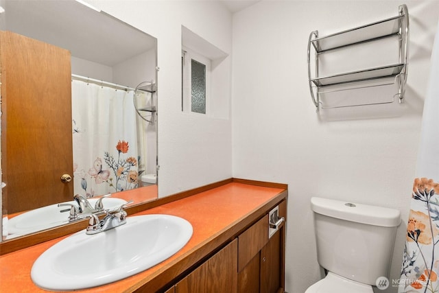 525527 16th Ave SE, Olympia, WA 98501 - full bath featuring toilet, vanity, and a shower with shower curtain