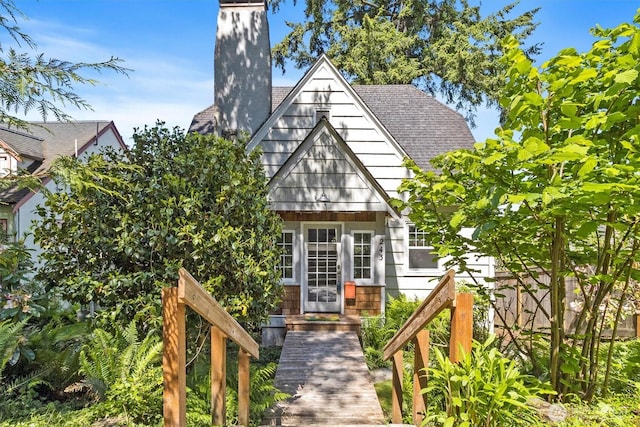 243 N Garden St, Bellingham, WA 98225 - view of front of home with a chimney and roof with shingles