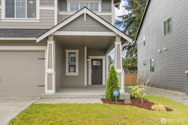 3808 181st St E, Tacoma, WA 98446 - entrance to property with covered porch, an attached garage, roof with shingles, and a lawn