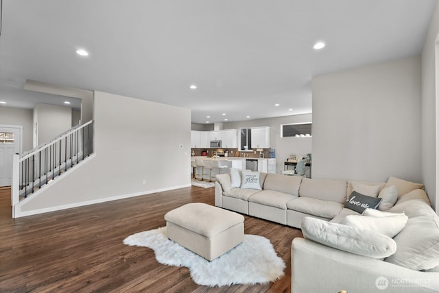 3808 181st St E, Tacoma, WA 98446 - living area with stairs, recessed lighting, dark wood-style flooring, and baseboards