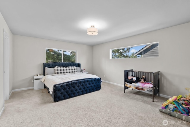 3808 181st St E, Tacoma, WA 98446 - bedroom with multiple windows, carpet floors, and baseboards