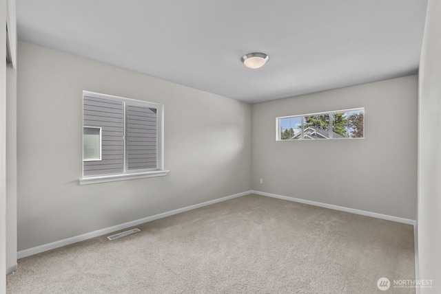 3808 181st St E, Tacoma, WA 98446 - empty room featuring carpet and baseboards