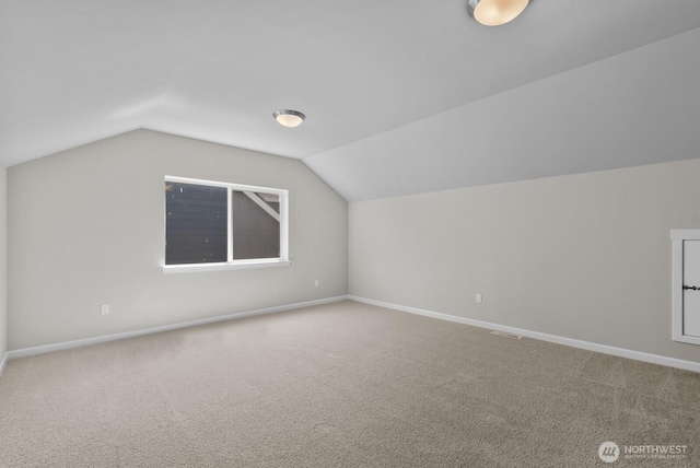 3808 181st St E, Tacoma, WA 98446 - bonus room featuring carpet flooring, vaulted ceiling, and baseboards