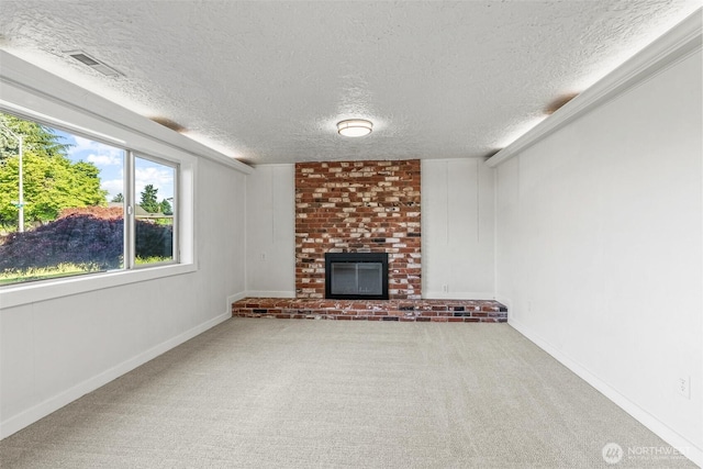 6015 NW Perthshire Rd, Vancouver, WA 98663 - unfurnished living room with a textured ceiling, a brick fireplace, carpet, and baseboards